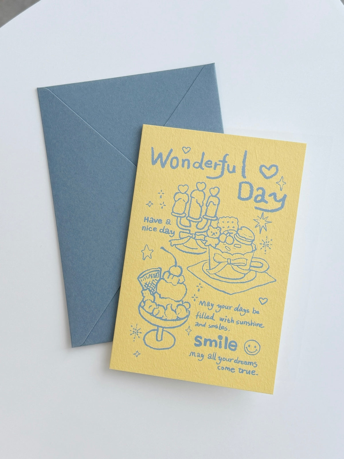 Yellow Wonderful Day illustrated greeting card with sweet treats and coordinating blue envelop